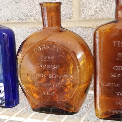 Collection Colored Bottles Herbs Spices
