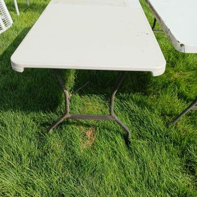 6 FOOT FOLDING TABLE AND A 4 FOOT TABLE
