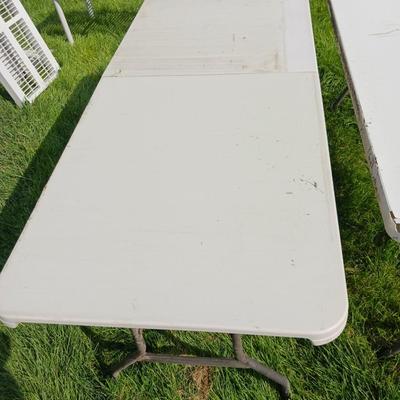 6 FOOT FOLDING TABLE AND A 4 FOOT TABLE