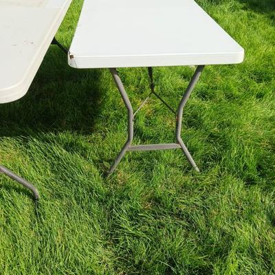 6 FOOT FOLDING TABLE AND A 4 FOOT TABLE