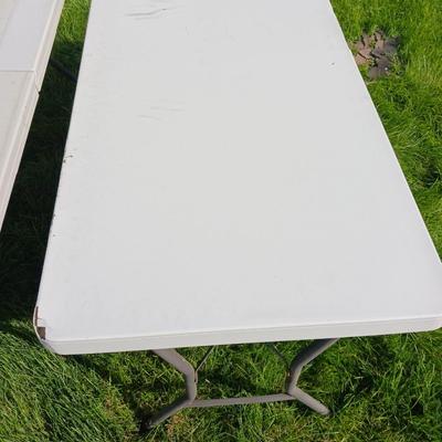 6 FOOT FOLDING TABLE AND A 4 FOOT TABLE