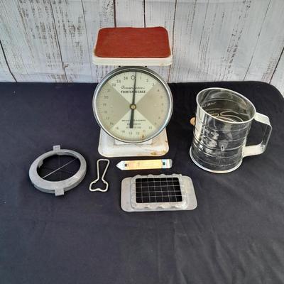 Vintage Kitchen scale with an assortment of vintage kitchen items