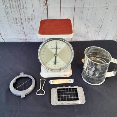 Vintage Kitchen scale with an assortment of vintage kitchen items