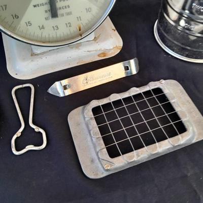 Vintage Kitchen scale with an assortment of vintage kitchen items