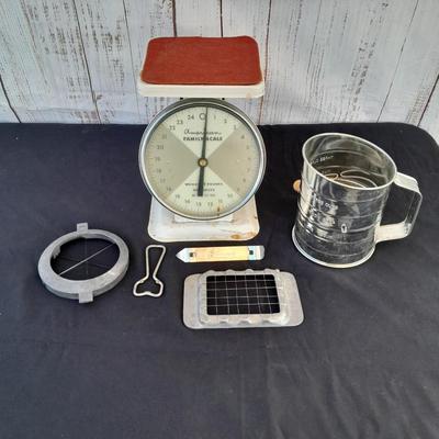 Vintage Kitchen scale with an assortment of vintage kitchen items
