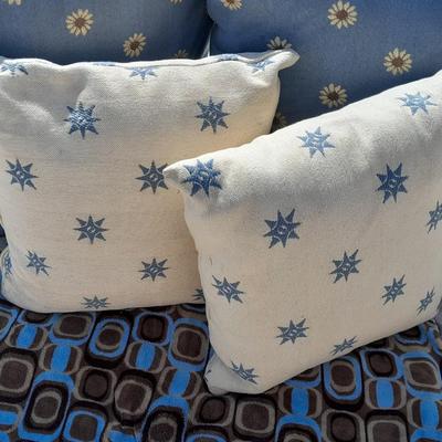 Large sized throw pillows with zippers and a soft lap blanket