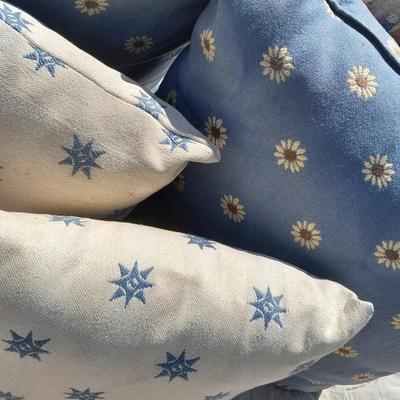 Large sized throw pillows with zippers and a soft lap blanket