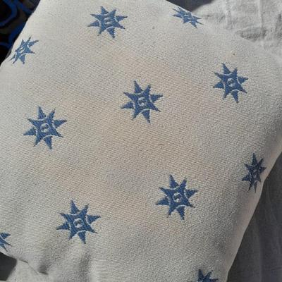 Large sized throw pillows with zippers and a soft lap blanket