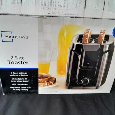 Nice toaster and Rival mixer - lightly used in original boxes
