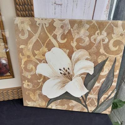 Floral wall art - two matching canvass pictures and a large, framed vase with flowers