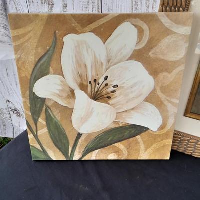 Floral wall art - two matching canvass pictures and a large, framed vase with flowers