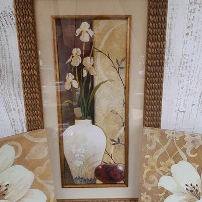 Floral wall art - two matching canvass pictures and a large, framed vase with flowers