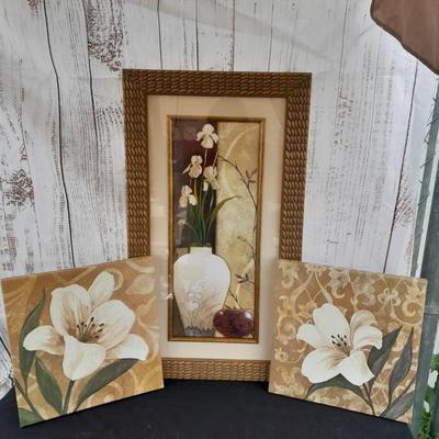 Floral wall art - two matching canvass pictures and a large, framed vase with flowers