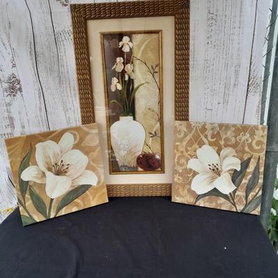 Floral wall art - two matching canvass pictures and a large, framed vase with flowers
