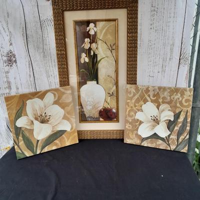 Floral wall art - two matching canvass pictures and a large, framed vase with flowers