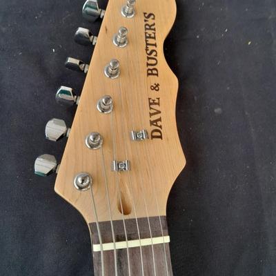 Dave & Buster's electric Guitar with stand