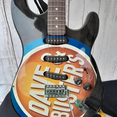 Dave & Buster's electric Guitar with stand