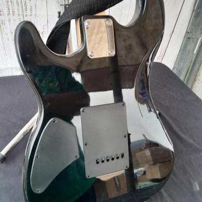 Dave & Buster's electric Guitar with stand