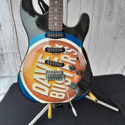 Dave & Buster's electric Guitar with stand