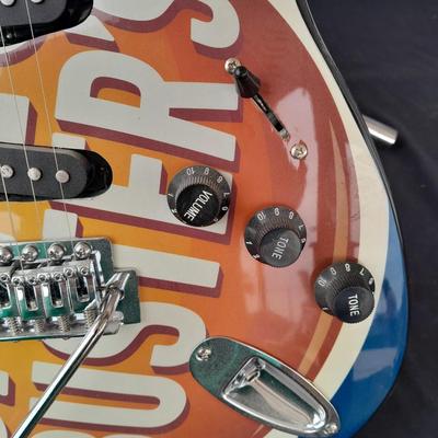 Dave & Buster's electric Guitar with stand