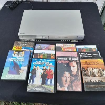 Philips DVD /VHS player with an assortment of DVDS