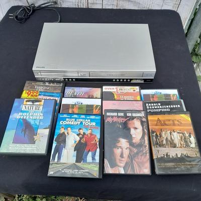 Philips DVD /VHS player with an assortment of DVDS