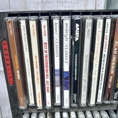 Colby boombox stereo with an assortment of music on cd's