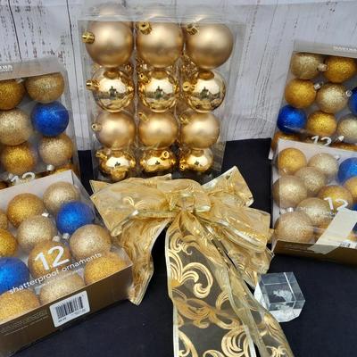 Gold glass Christmas ornaments with blue & gold glitter ornaments and a nice big bow