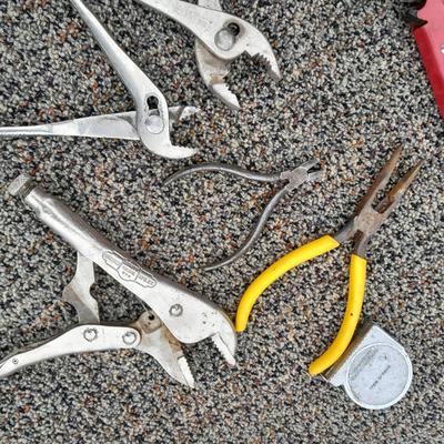 Assortment of pliers and crescent wrench