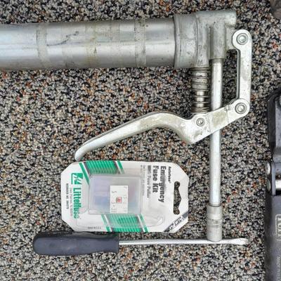 Assortment of hand tools - rubber mallet - grease gun - oil filter wrench and more