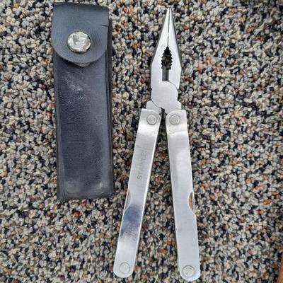 Assortment of hand tools - rubber mallet - grease gun - oil filter wrench and more