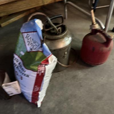 Oil filters, kerosene can, and gas cans