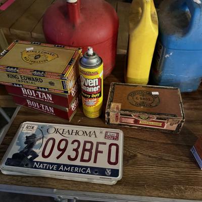 Oil filters, kerosene can, and gas cans