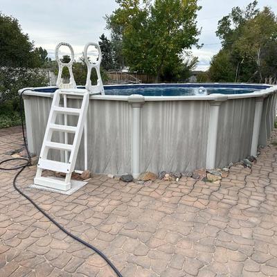 HUGE ABOVE GROUND POOL WITH HEATER