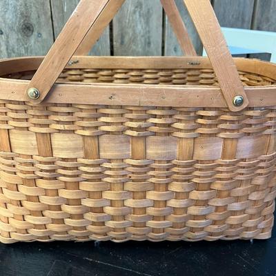 Two Mid Century Handwoven Rattan Handled Baskets