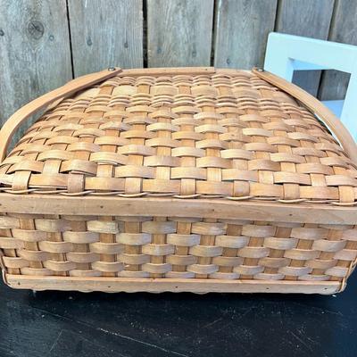 Two Mid Century Handwoven Rattan Handled Baskets