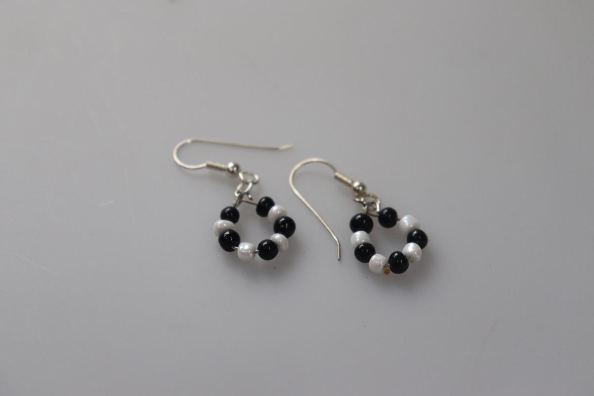 Black and white circle dangling earrings