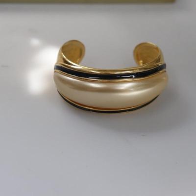 Gold and black bracelet
