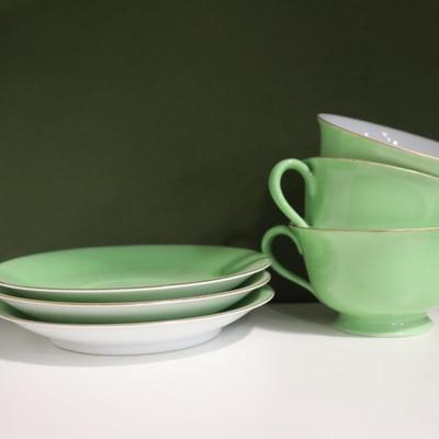 A set of Vintage Japanese hand-painted Noritake porcelain green teacup/coffee cup and saucer