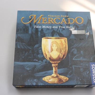 Mercado False Money and True Status Games
