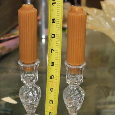 Crystal candle stick holders with two organge candles