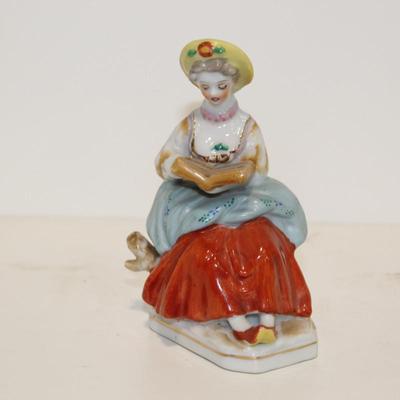 OCCUPIED JAPAN 5" PORCELAIN FIGURINE - LADY READING MUSIC
