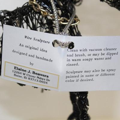 Wire dog statue