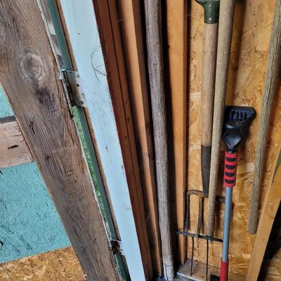 3 pitchforks, 1 pitchfork handle off, walking stick and icescraper