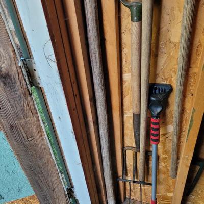 3 pitchforks, 1 pitchfork handle off, walking stick and icescraper