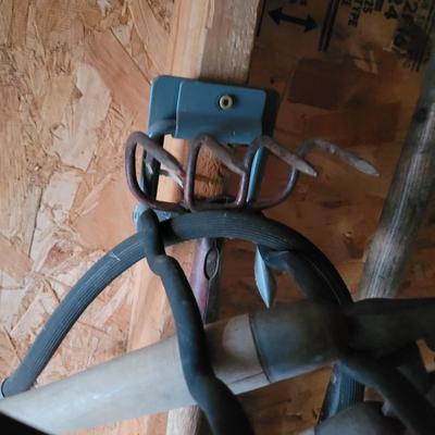 Scoop shovel, 2 limb shears, tined hoe and brass sprayer nozzle
