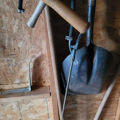 Scoop shovel, 2 limb shears, tined hoe and brass sprayer nozzle