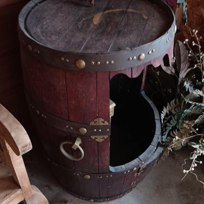 LARGE WHISKEY BARREL THAT HAS BEEN MODIFIED