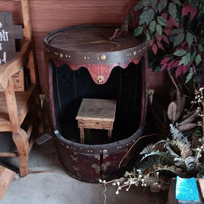 LARGE WHISKEY BARREL THAT HAS BEEN MODIFIED