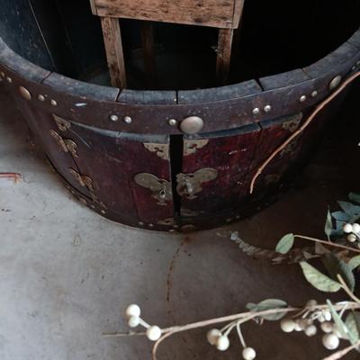 LARGE WHISKEY BARREL THAT HAS BEEN MODIFIED